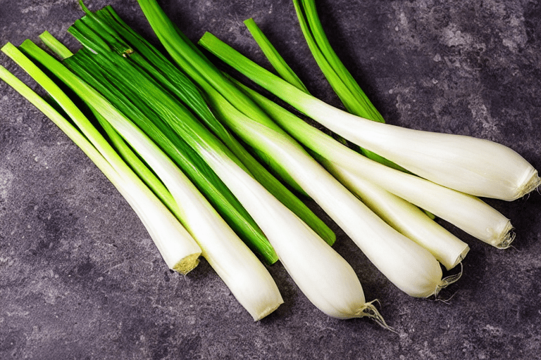 Prepare the scallions and aromatics. Cut the scallions into 5 cm sections, separating the white and